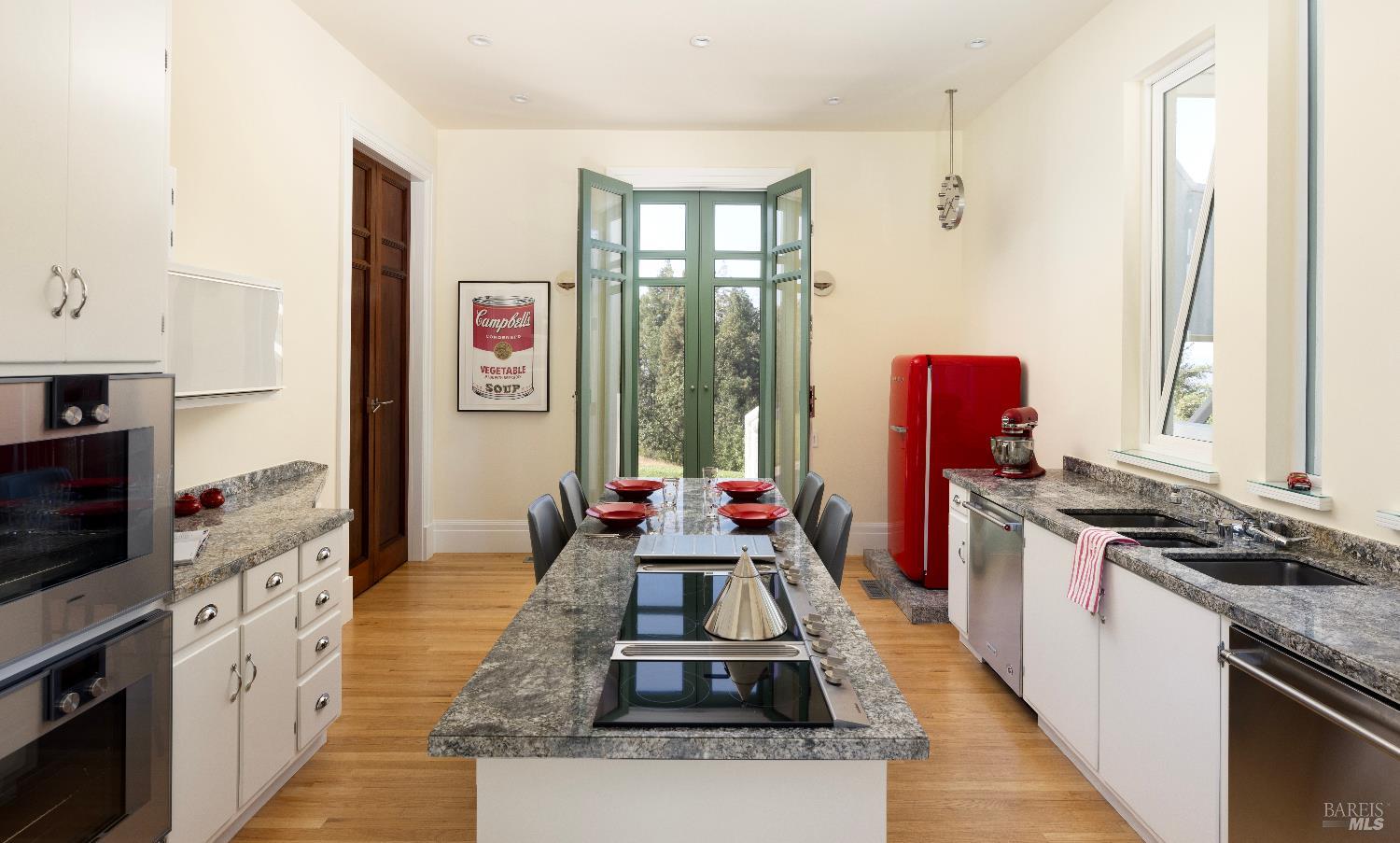 3000 Mt Veeder Road Napa, CA 94558 - Photo 24 of 85 a kitchen with stainless steel appliances granite countertop a stove a sink and a refrigerator