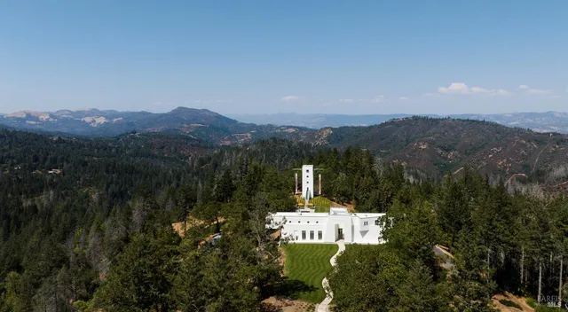 a view of a house with a street