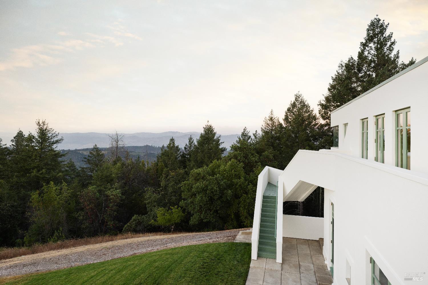 3000 Mt Veeder Road Napa, CA 94558 - Photo 40 of 85 a view of a house with backyard and a forest