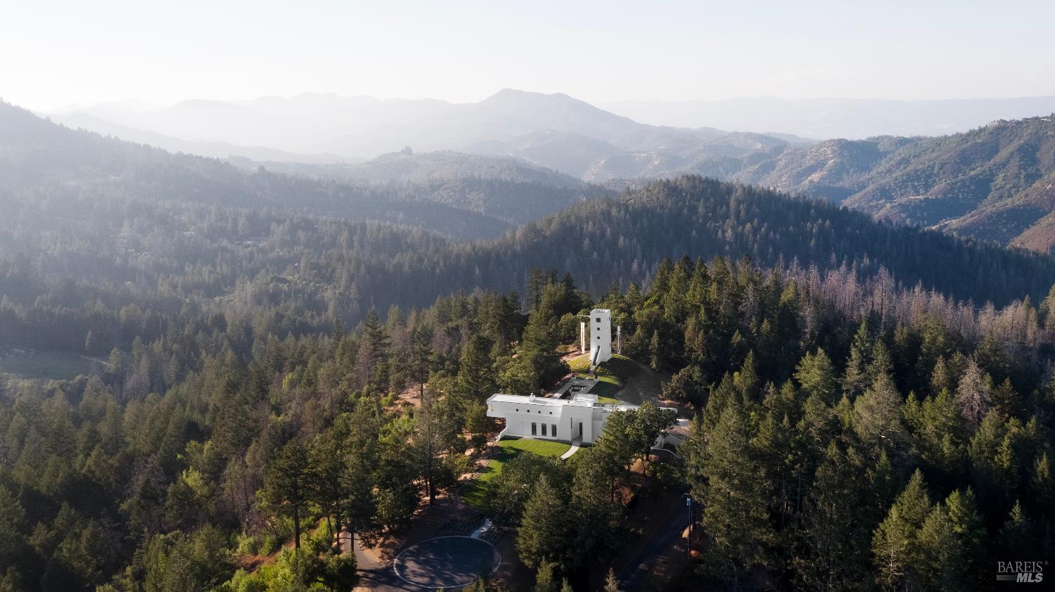 3000 Mt Veeder Road Napa, CA 94558 - Photo 84 of 85 a view of a house with a mountain in the background
