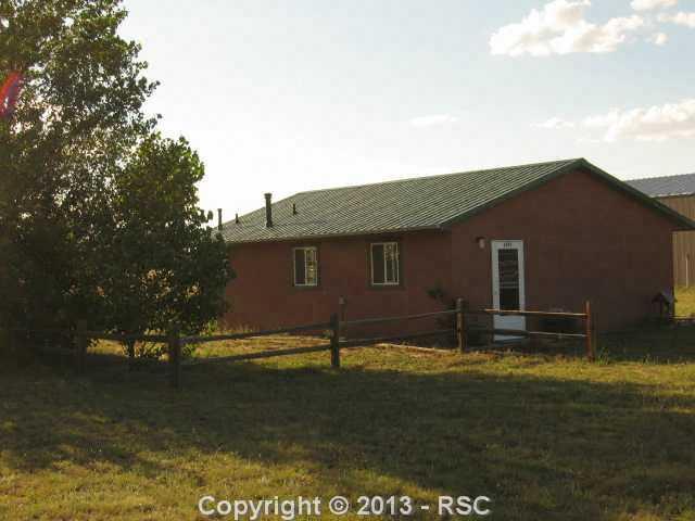 1450 Buck Road Calhan, CO 80808 - Photo 2 of 25 The one bedroom, one bathroom guest home is a great rental, mother in law quarters or man cave. There is a bathroom and kitchen too. Located nearest the entry gate to the property, the main home maintains its privacy.