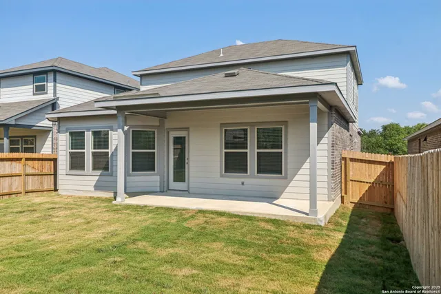 a picture of a bench in front of statue
