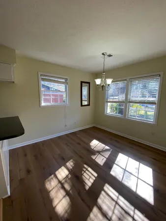 a view of an empty room and window