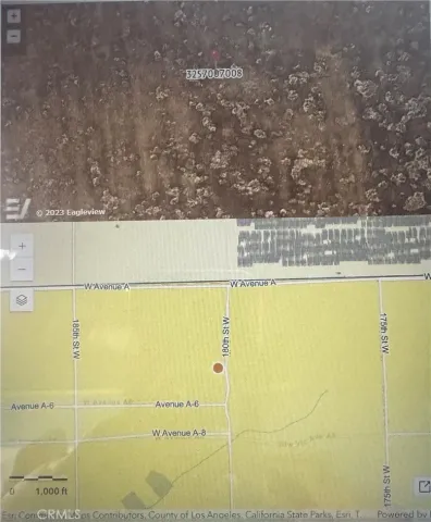 a view of a swimming pool and an outdoor space