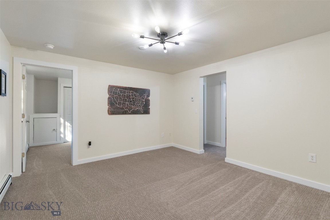 3033 Wes Davis Road Belgrade, MT 59714 - Photo 37 of 91 Basement landing - fresh carpet and paint