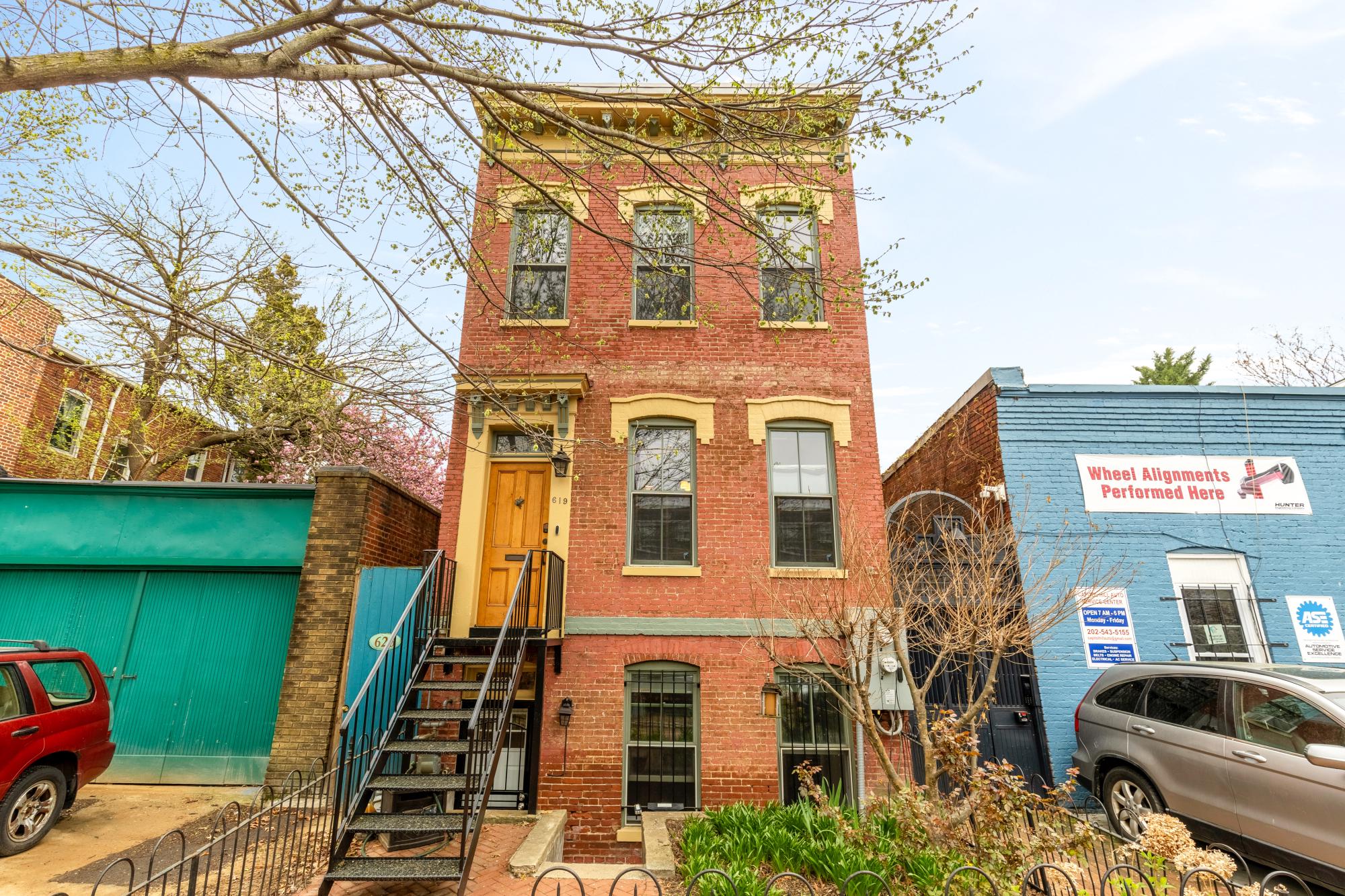 a front view of a house with a yard