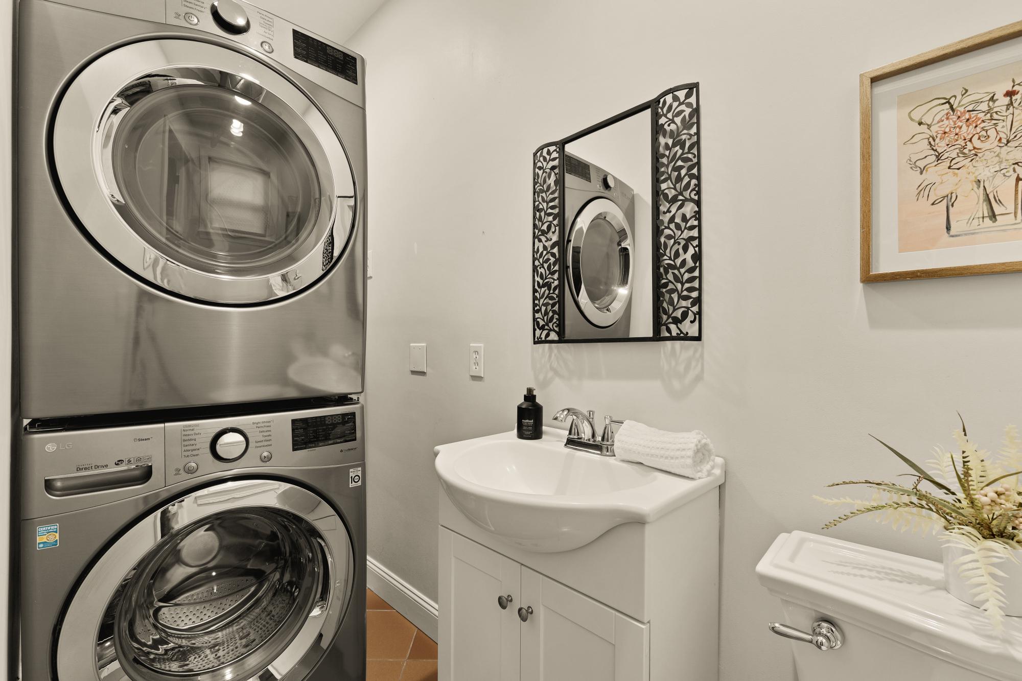 619 Independence Avenue Southeast Washington, DC 20003 - Photo 16 of 38 a utility room with sink dryer and washer