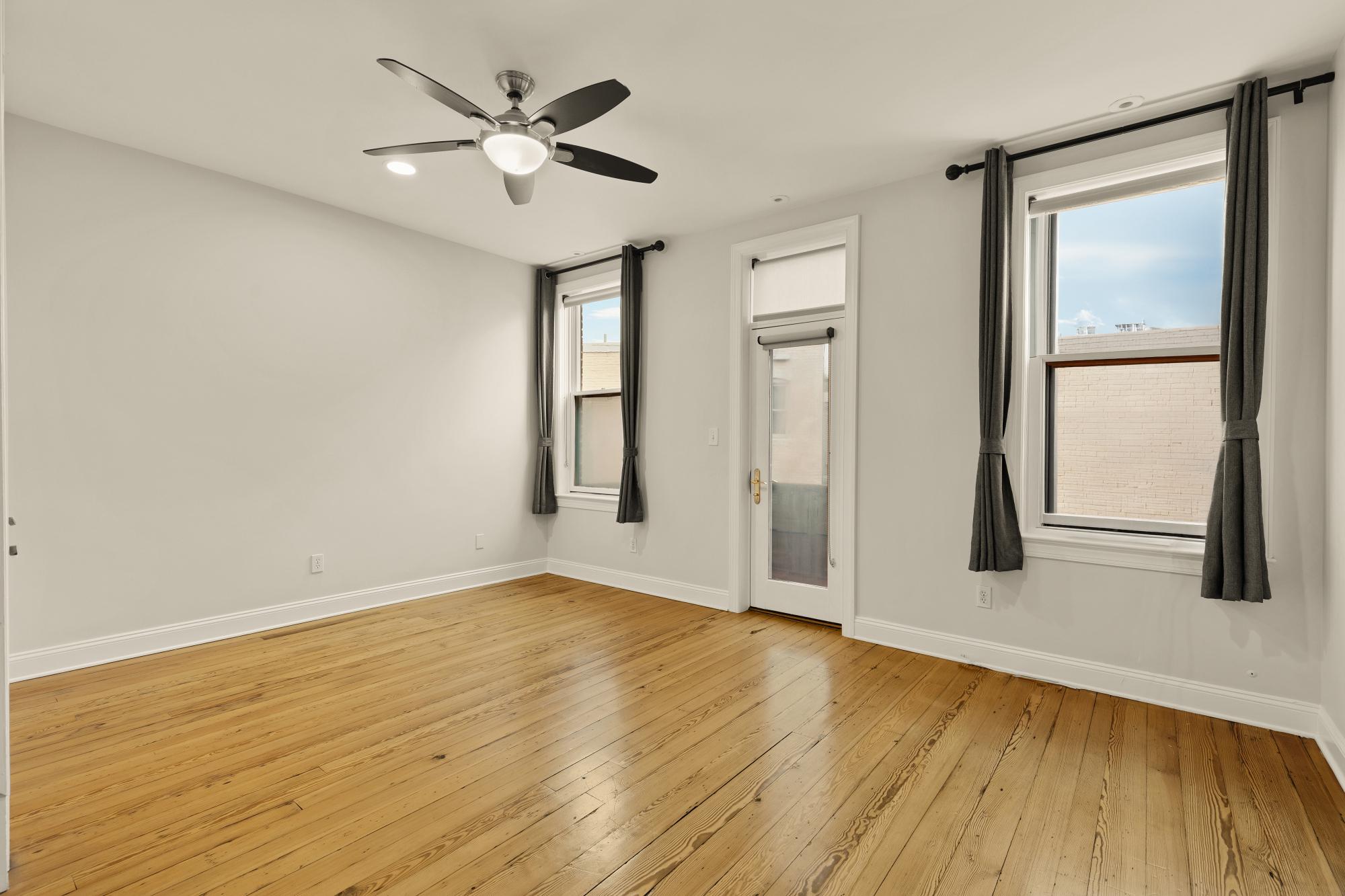 619 Independence Avenue Southeast Washington, DC 20003 - Photo 25 of 38 wooden floor in an empty room with a window