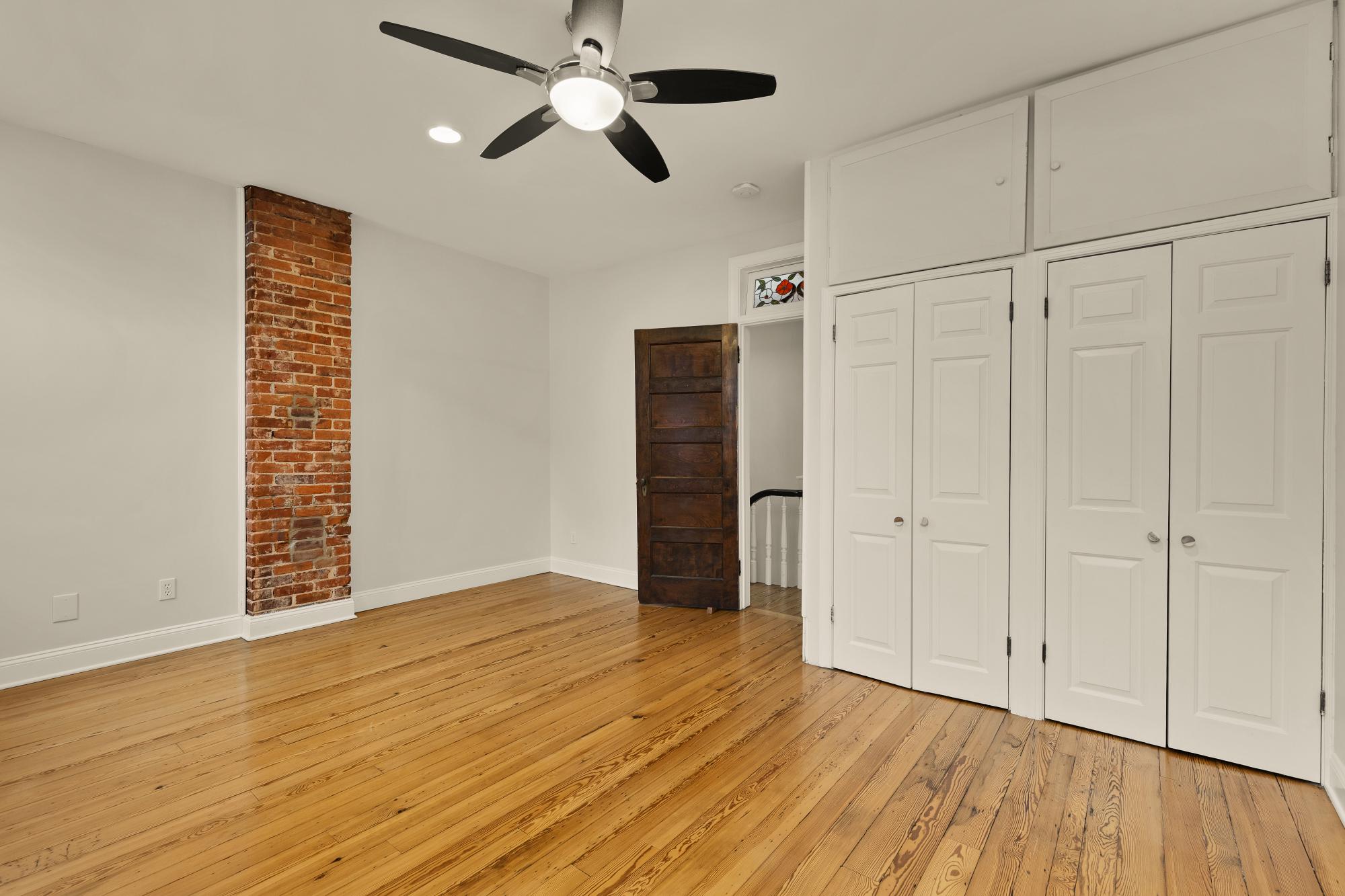 619 Independence Avenue Southeast Washington, DC 20003 - Photo 26 of 38 an empty room with wooden floor closet and windows