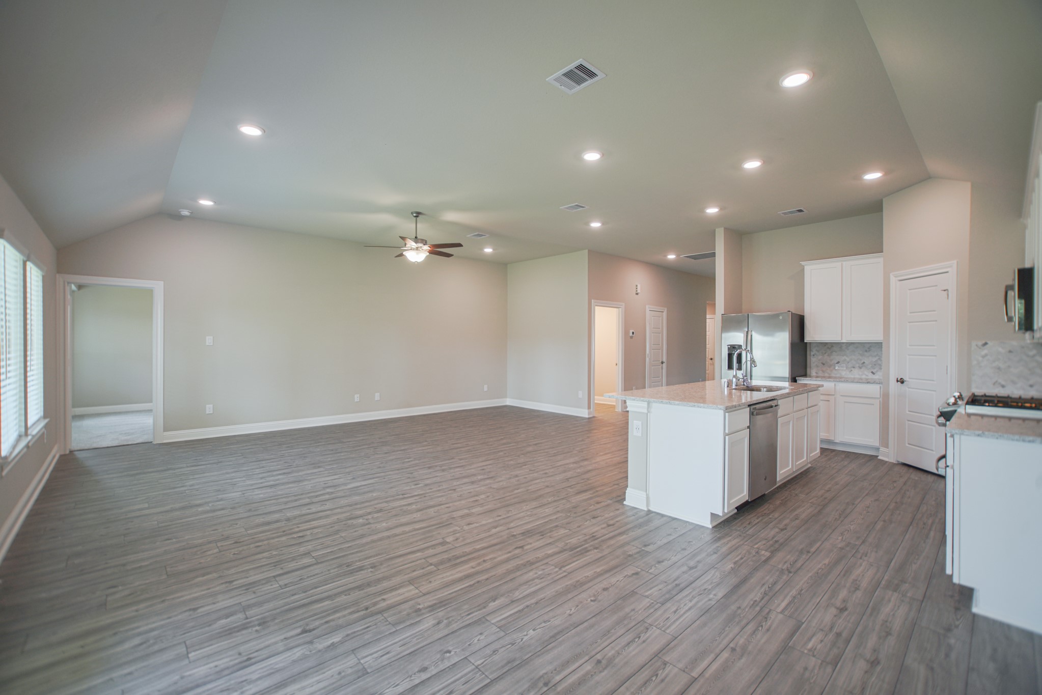 17112 Coneflower Place Conroe, TX 77385 - Photo 13 of 27 a view of kitchen with wooden floor