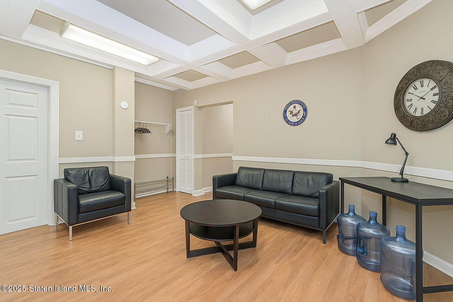 4062 Amboy Road Staten Island, NY 10308 - Photo 16 of 21 a living room with furniture and a wooden floor