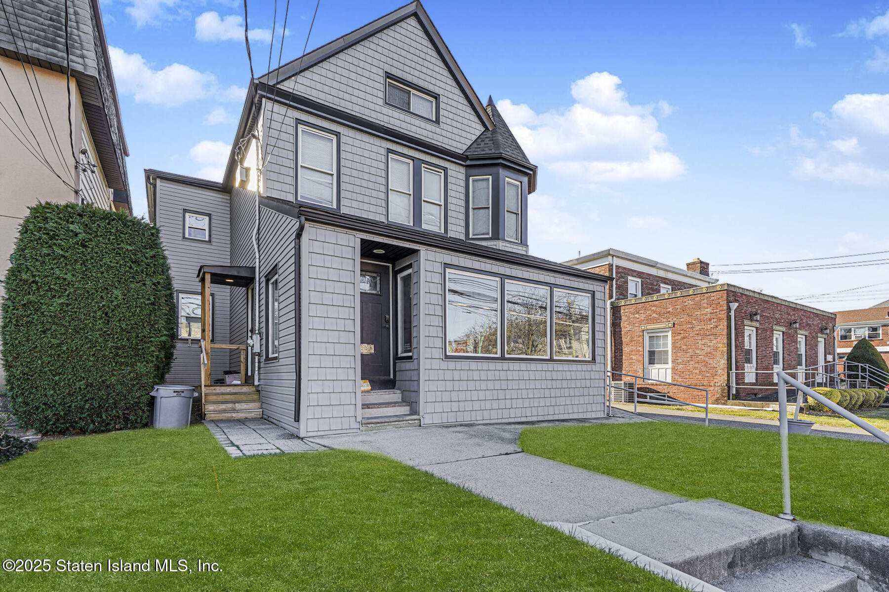 4062 Amboy Road Staten Island, NY 10308 - Photo 2 of 21 a front view of a house with a garden