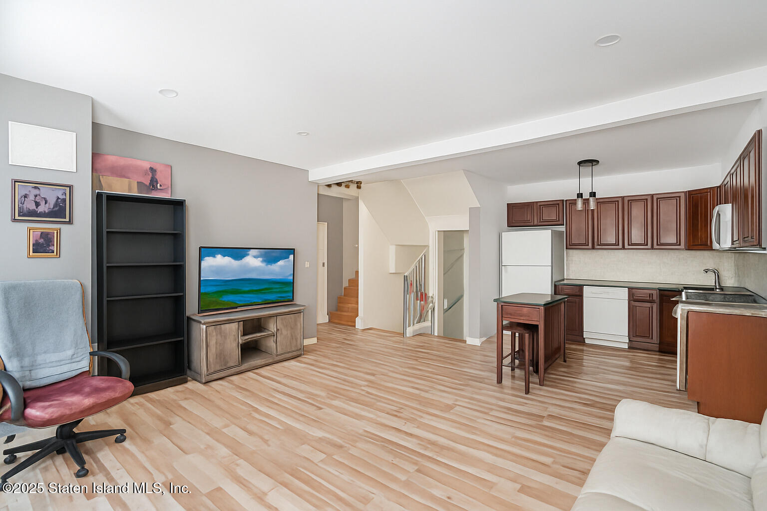 4062 Amboy Road Staten Island, NY 10308 - Photo 7 of 21 a bed room with a bed and a television