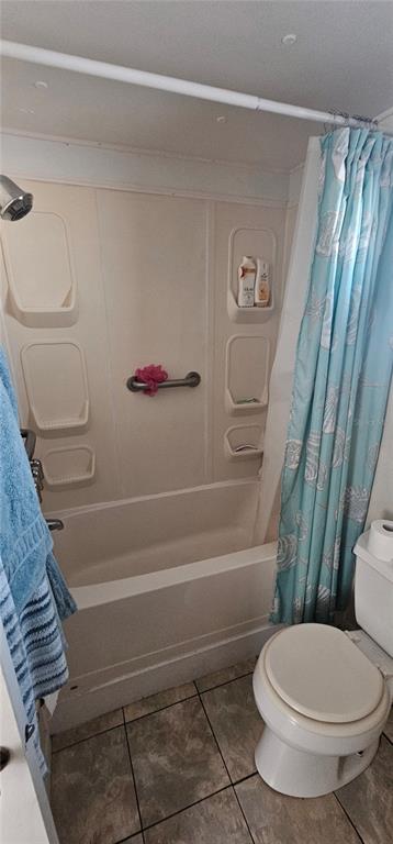 10315 Cortez Road West, Unit 242 Bradenton, FL 34210 - Photo 12 of 18 a bathroom with a toilet and a shower