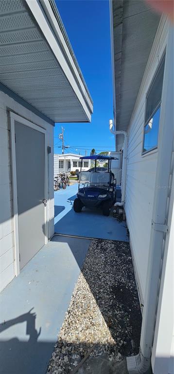 10315 Cortez Road West, Unit 242 Bradenton, FL 34210 - Photo 5 of 18 a living room with furniture and a rug
