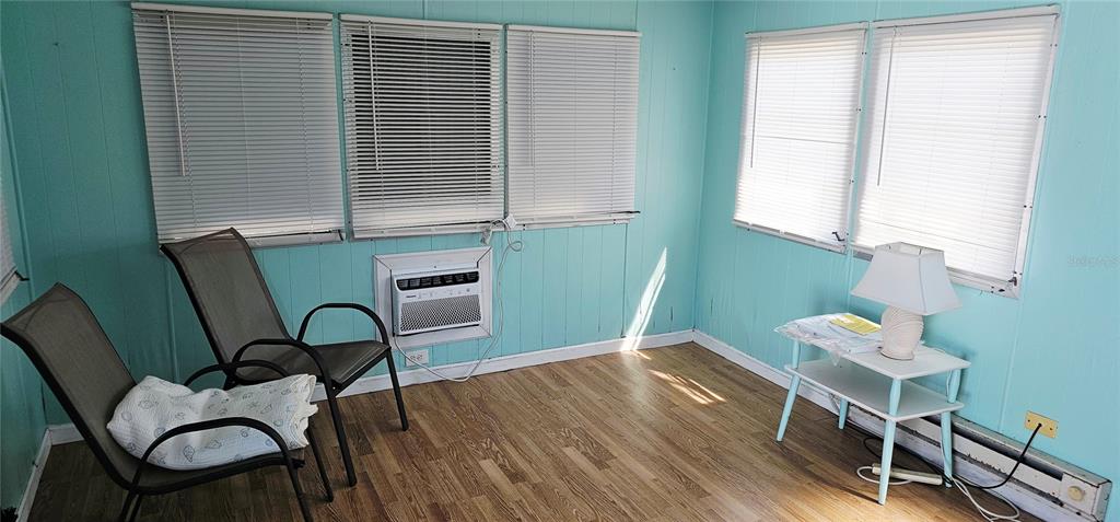 10315 Cortez Road West, Unit 242 Bradenton, FL 34210 - Photo 6 of 18 a view of a workspace room with furniture and a window