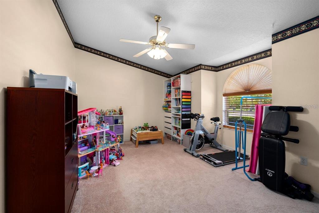 10228 Yellow Pine Way Hudson, FL 34667 - Photo 12 of 22 a view of a room with toys