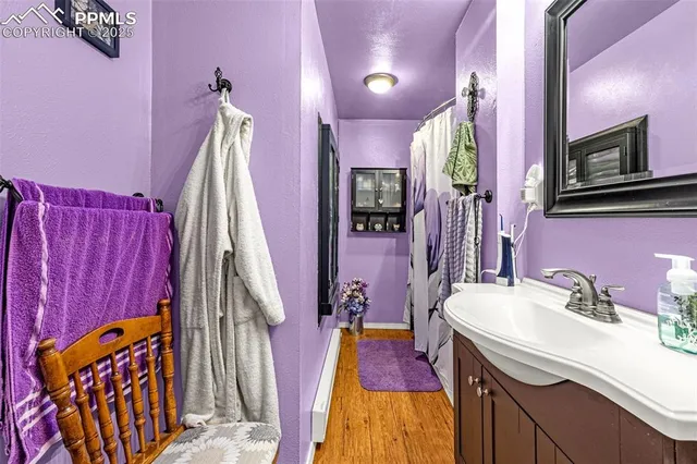 a kitchen with cabinets appliances and a window