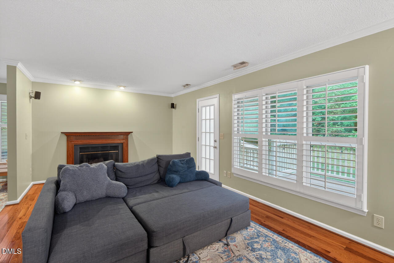 3307 Coachman's Way Durham, NC 27705 - Photo 21 of 50 a living room with furniture and a large window