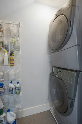 a bedroom with a bed and a television