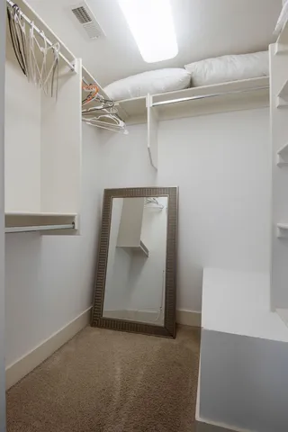 a view of an chairs and table in the balcony