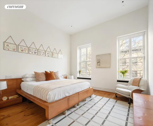 a view of a hallway with staircase