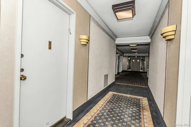 an aerial view of residential building with green space