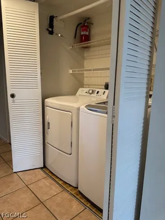 a bathroom with a granite countertop shower sink and toilet