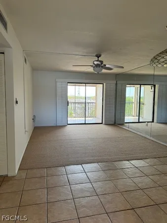 a view of a living room with furniture