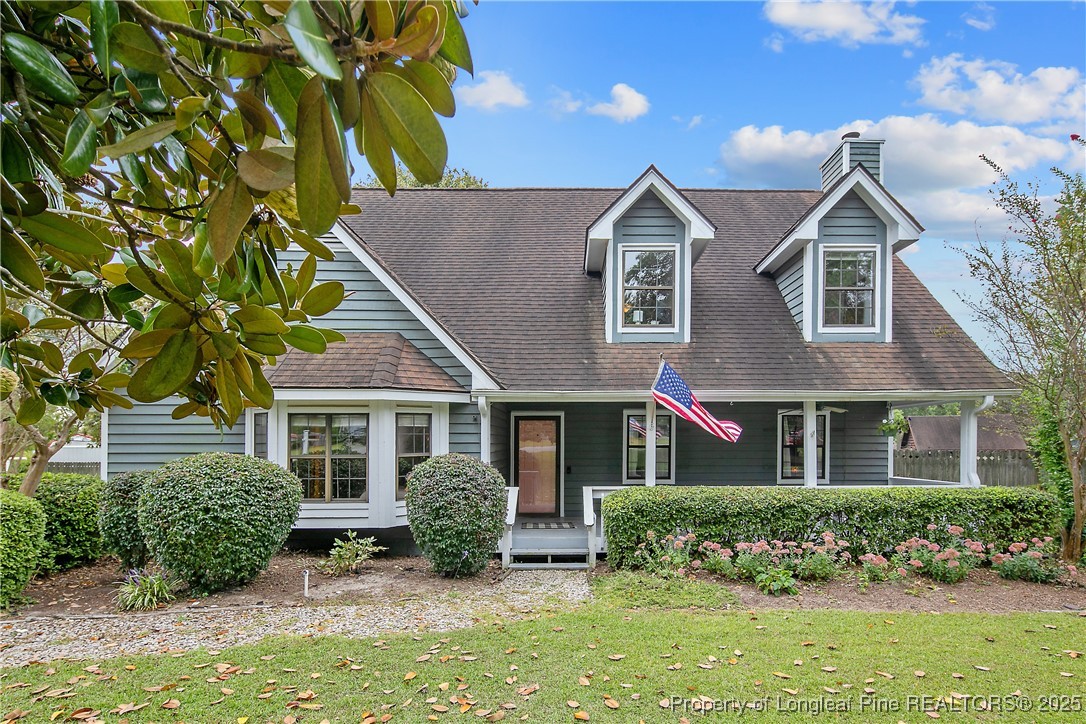 64 California Lane Spring Lake, NC 28390 - Photo 1 of 50 front view of a house with a yard