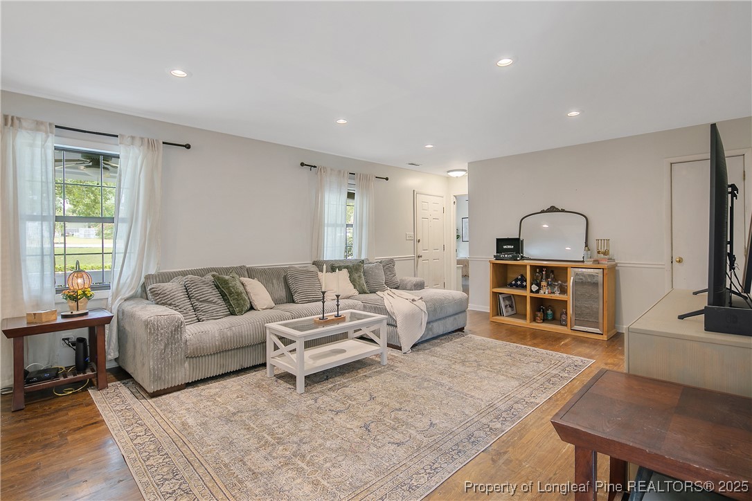 64 California Lane Spring Lake, NC 28390 - Photo 11 of 50 a living room with furniture fireplace and flat screen tv