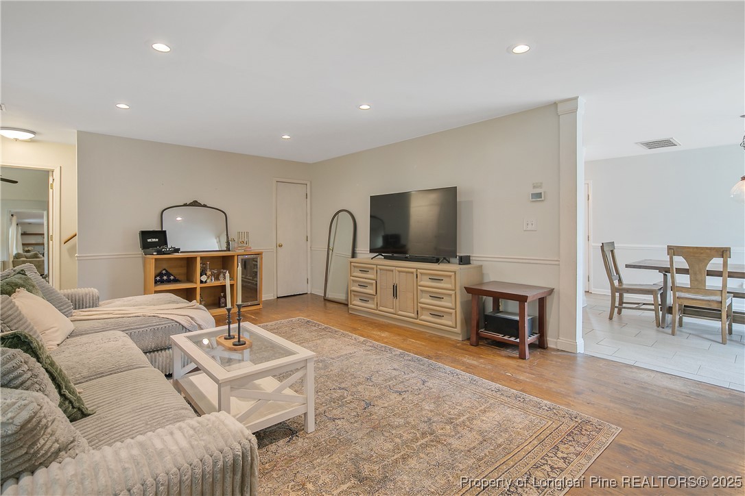 64 California Lane Spring Lake, NC 28390 - Photo 12 of 50 a living room with furniture and a flat screen tv