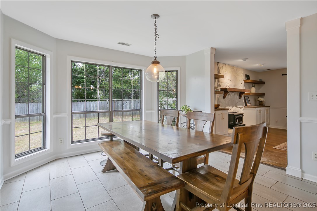 64 California Lane Spring Lake, NC 28390 - Photo 16 of 50 a dining room with furniture and window