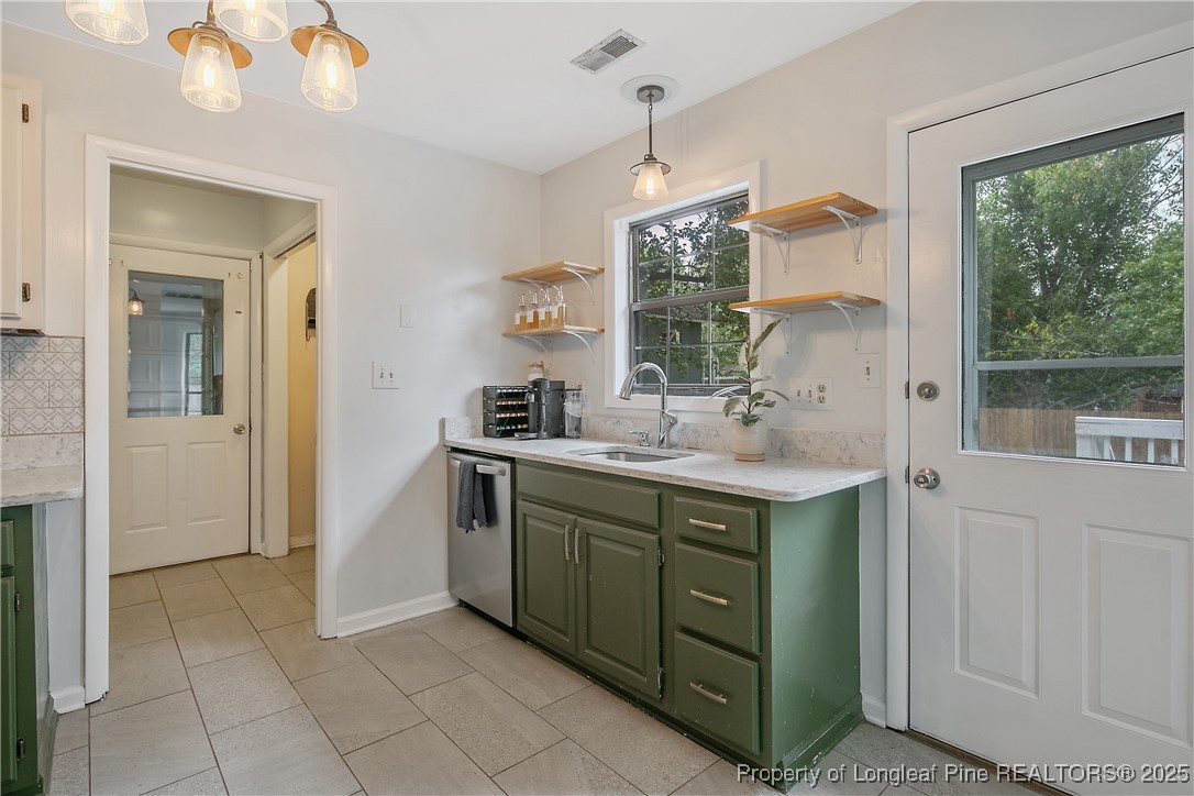 64 California Lane Spring Lake, NC 28390 - Photo 19 of 50 a bathroom with a sink vanity and mirror