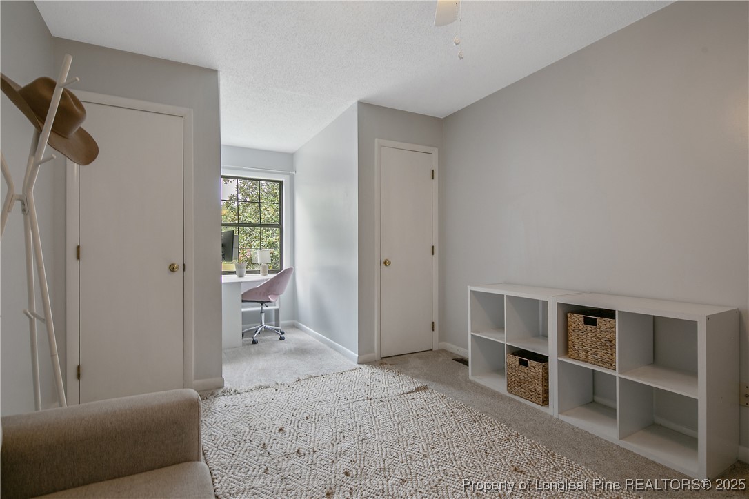 64 California Lane Spring Lake, NC 28390 - Photo 34 of 50 a living room with furniture and a window