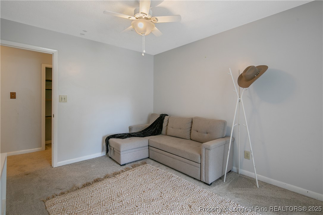 64 California Lane Spring Lake, NC 28390 - Photo 36 of 50 a living room with furniture and a ceiling fan