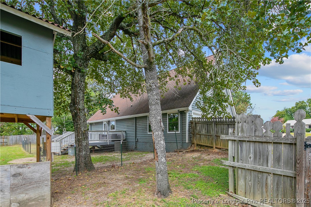 64 California Lane Spring Lake, NC 28390 - Photo 45 of 50 a view of house with a yard