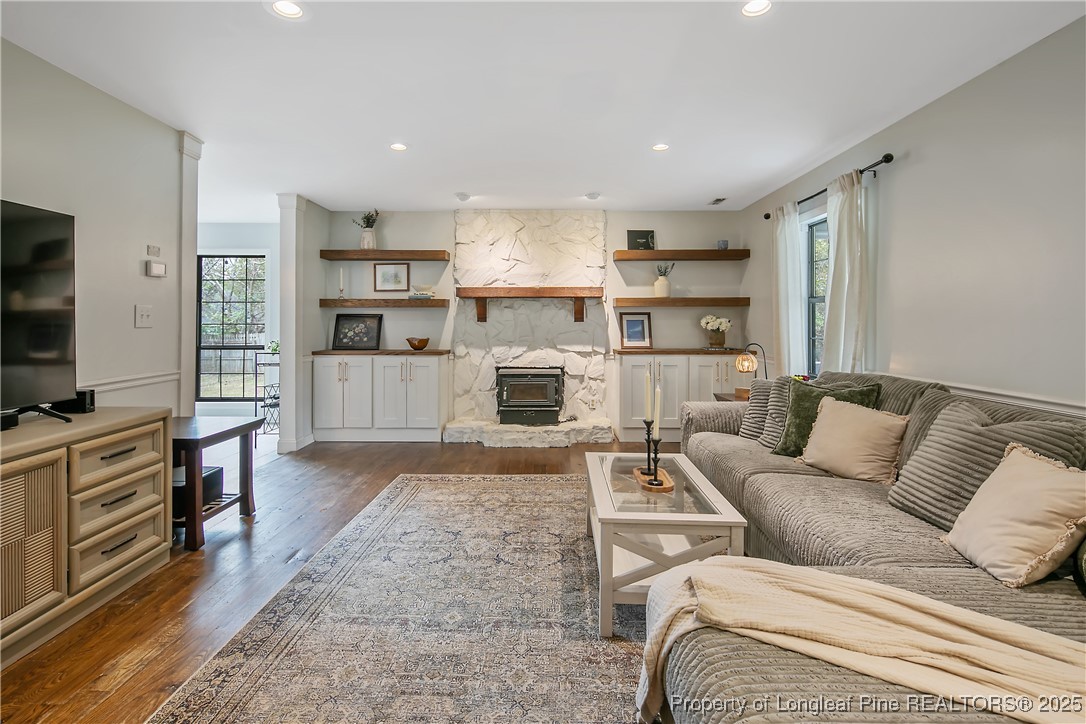 64 California Lane Spring Lake, NC 28390 - Photo 9 of 50 a living room with furniture and a flat screen tv