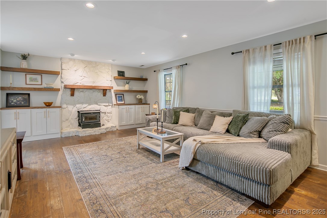 64 California Lane Spring Lake, NC 28390 - Photo 10 of 50 a living room with furniture and a fireplace