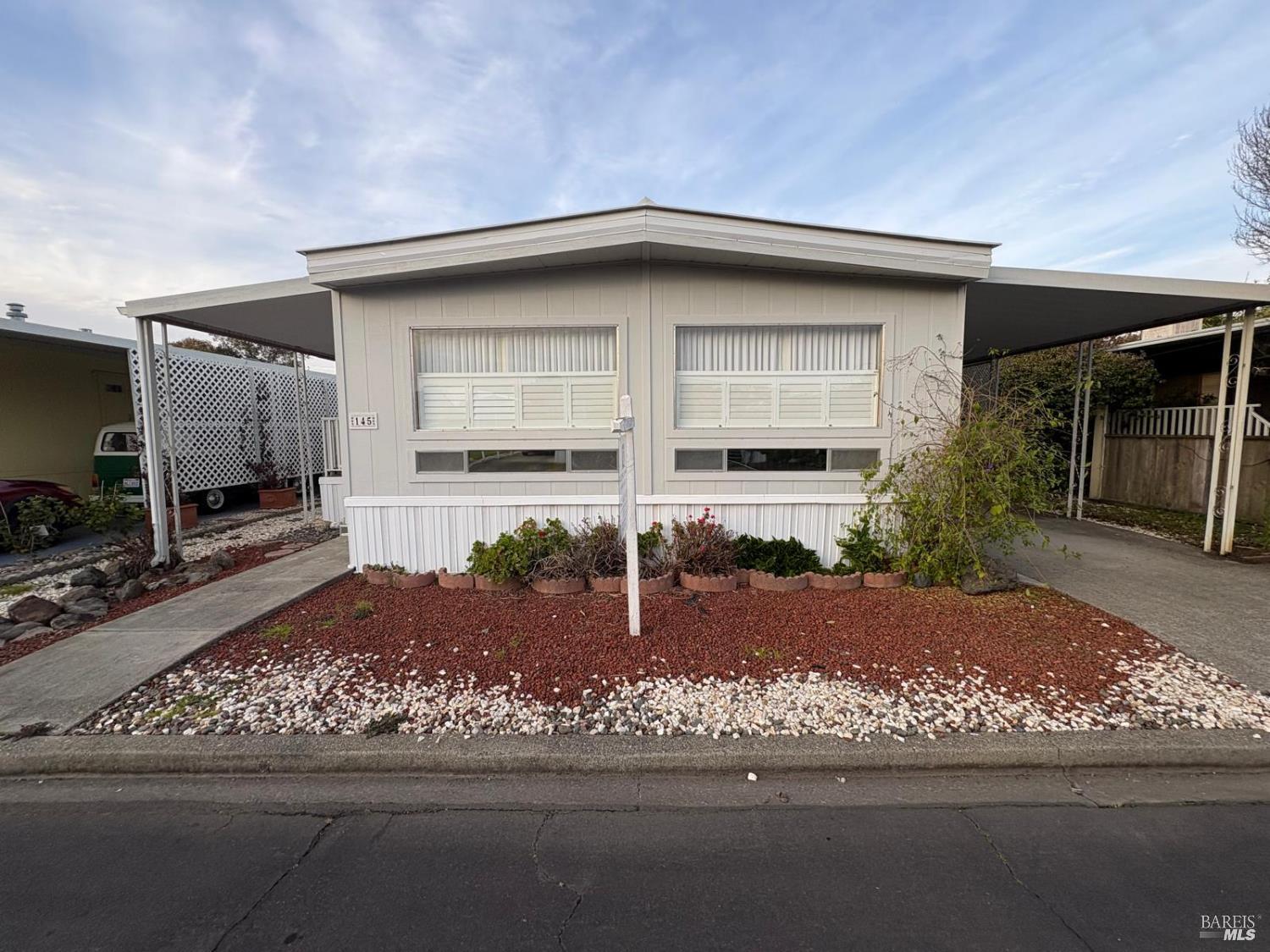 145 Stratford Way Santa Rosa, CA 95401 - Photo 1 of 48 a front view of a house with garden