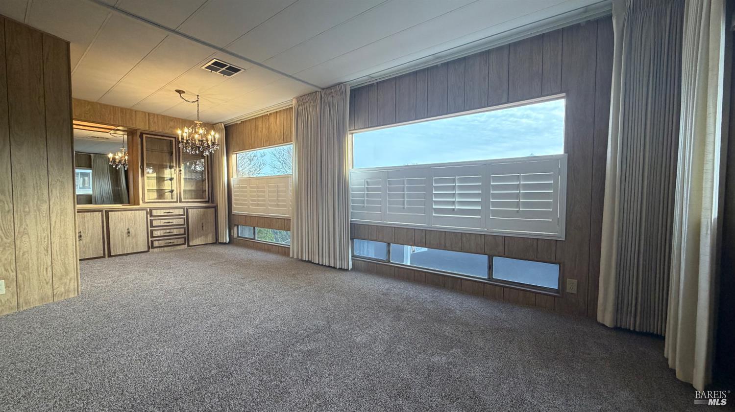 145 Stratford Way Santa Rosa, CA 95401 - Photo 12 of 48 a view of an empty room with a window