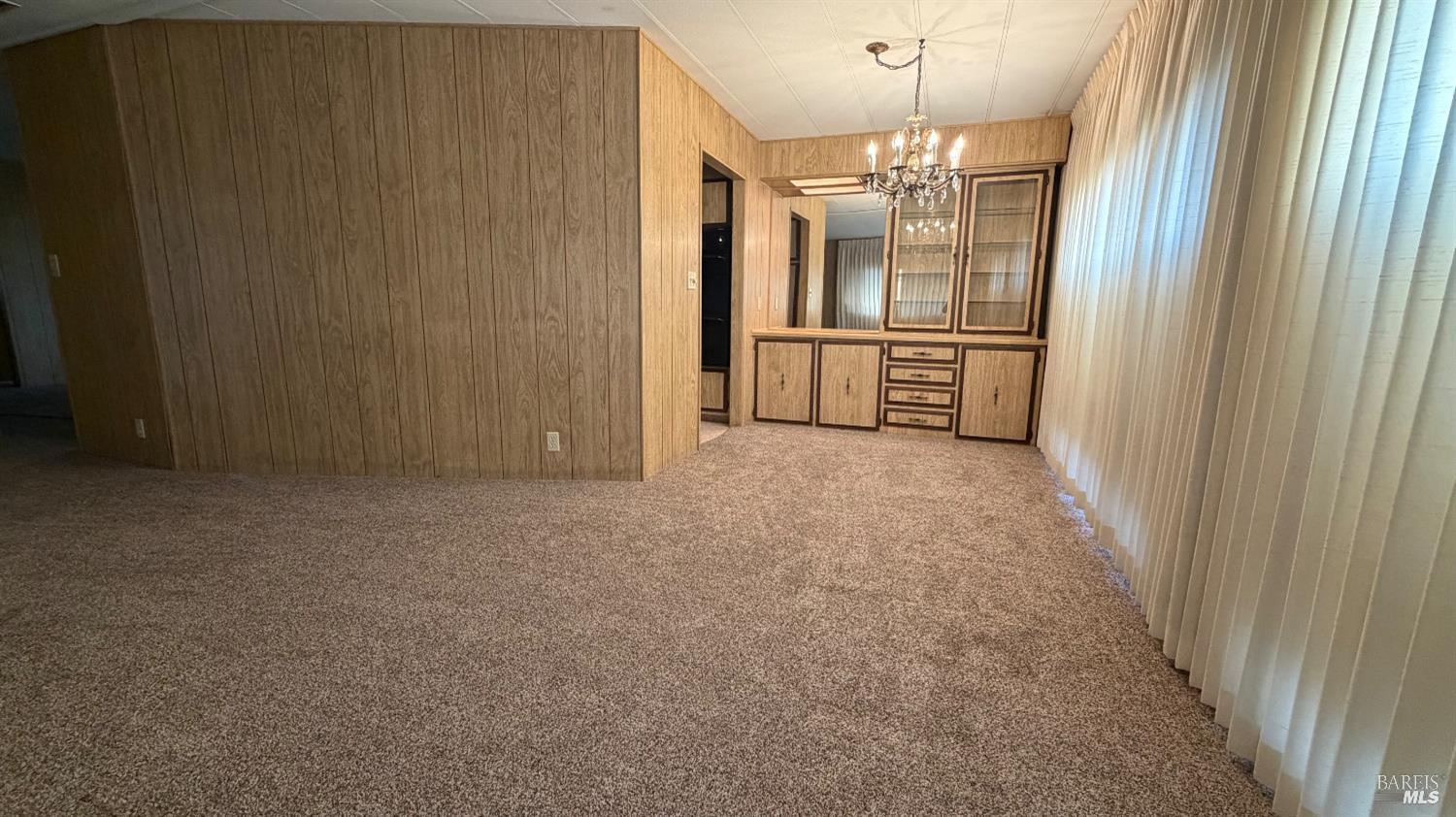 145 Stratford Way Santa Rosa, CA 95401 - Photo 13 of 48 a view of a kitchen with an entryway and a window