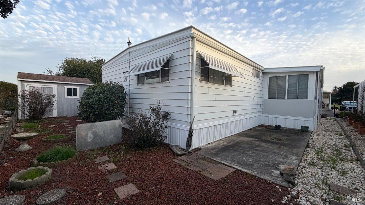 145 Stratford Way Santa Rosa, CA 95401 - Photo 2 of 48 a backyard of a house