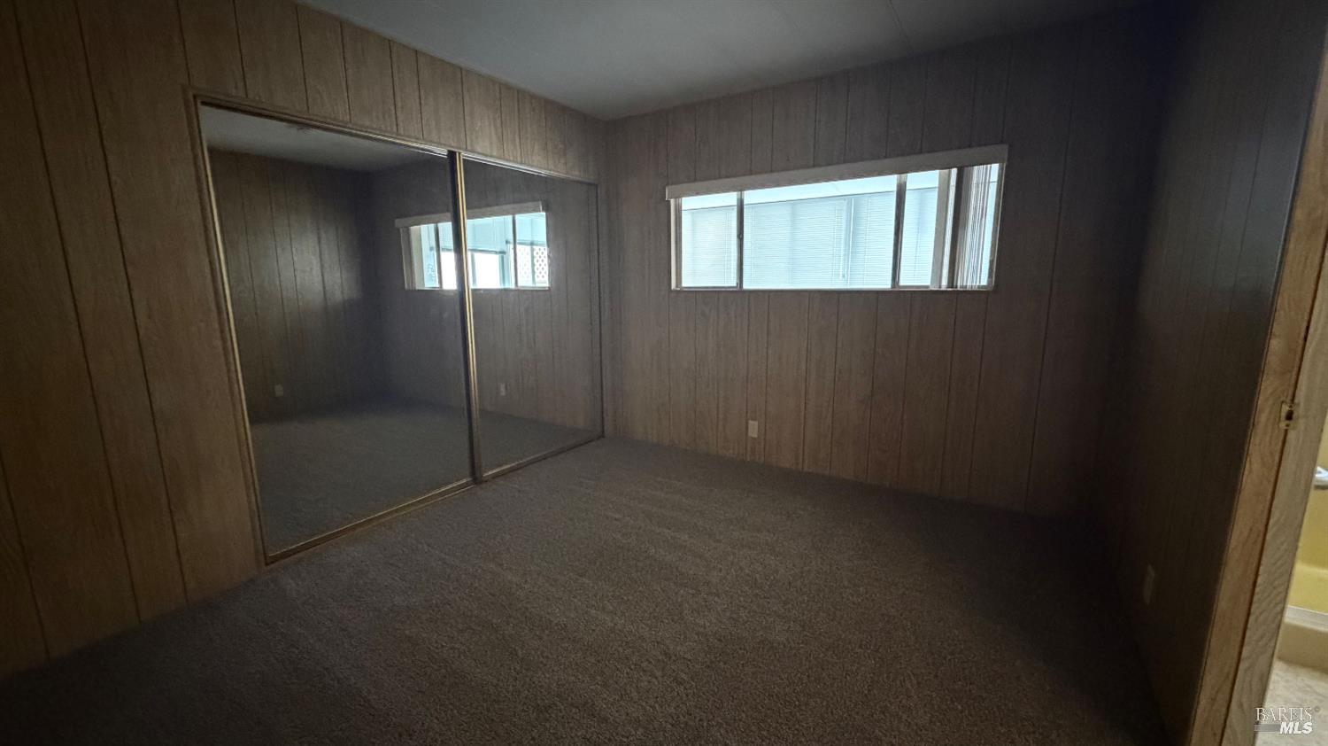 145 Stratford Way Santa Rosa, CA 95401 - Photo 22 of 48 a view of an empty room with window and closet area