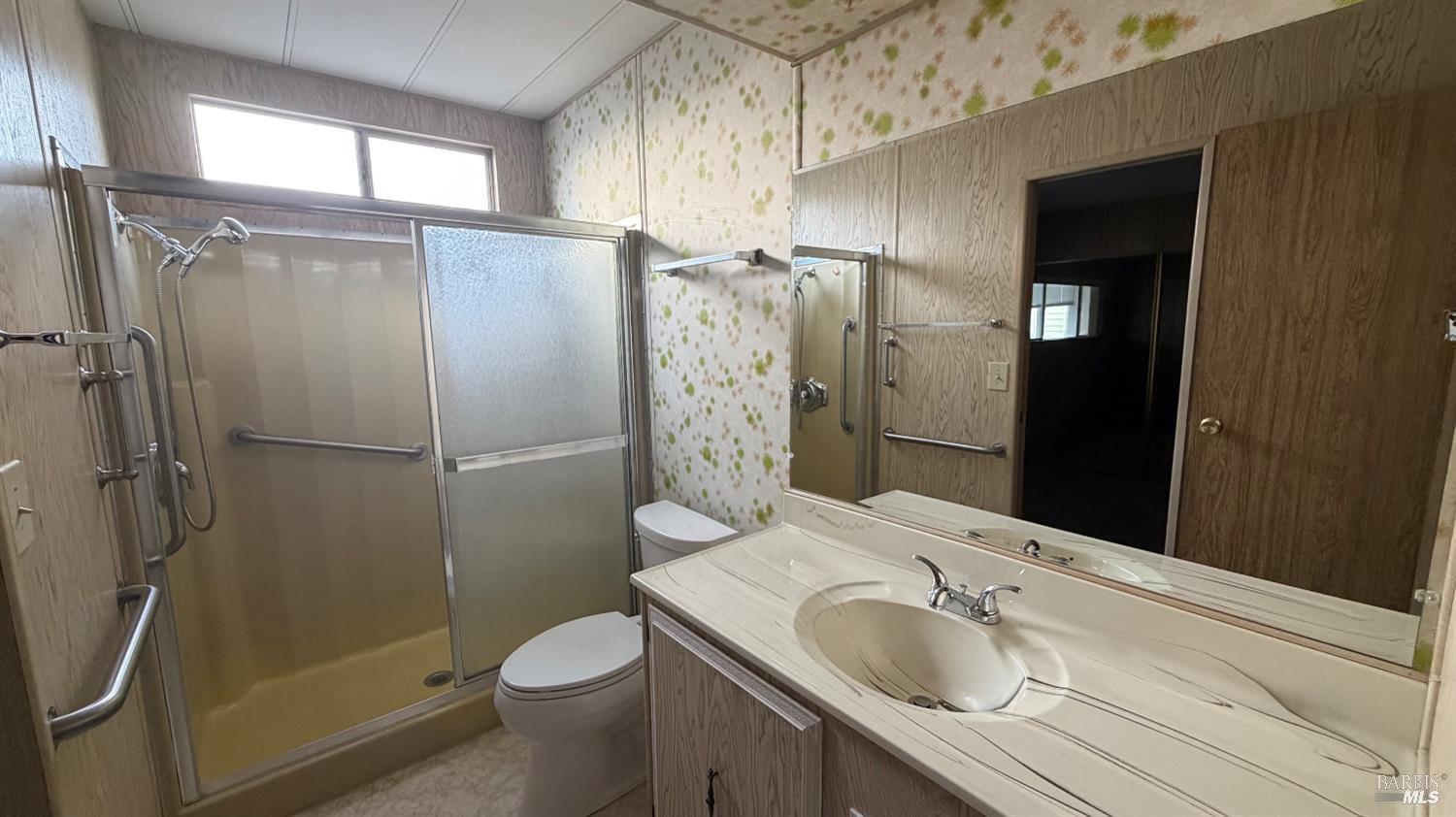 145 Stratford Way Santa Rosa, CA 95401 - Photo 23 of 48 a bathroom with a granite countertop sink toilet and shower
