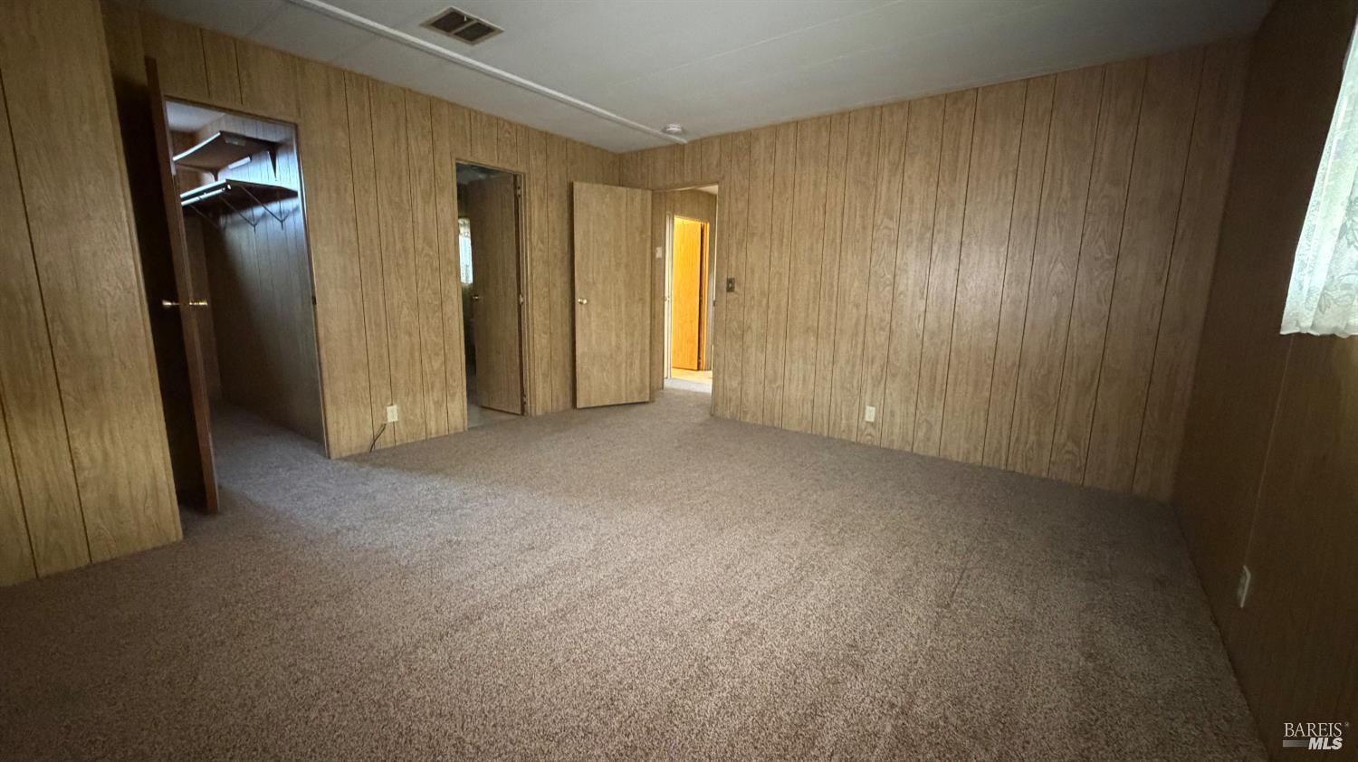 145 Stratford Way Santa Rosa, CA 95401 - Photo 25 of 48 a view of an empty room and a window