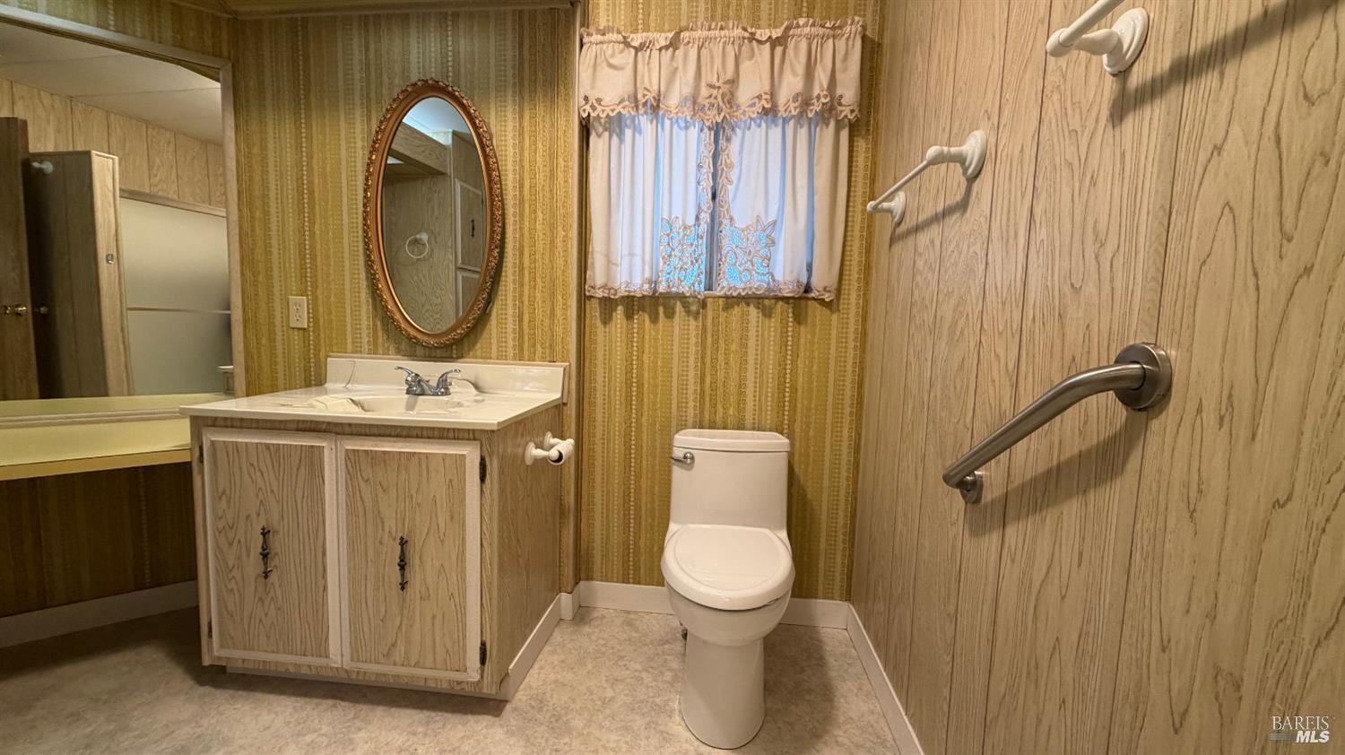 145 Stratford Way Santa Rosa, CA 95401 - Photo 27 of 48 a bathroom with a sink a toilet and shower