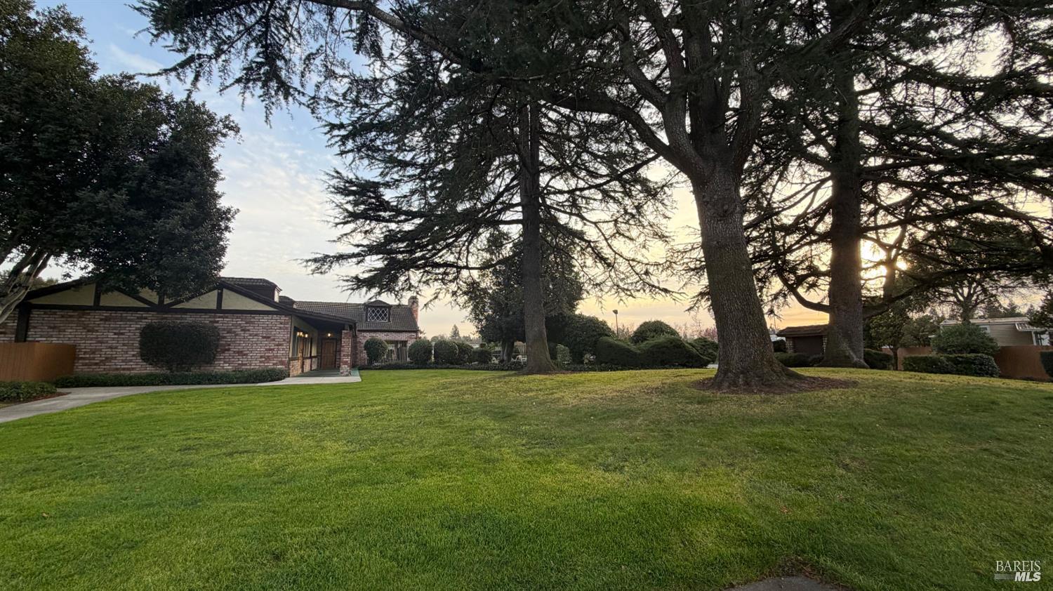 145 Stratford Way Santa Rosa, CA 95401 - Photo 47 of 48 a view of a green field with trees in the background