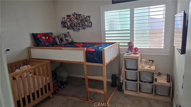 a room with furniture and a window