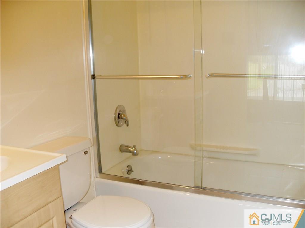 217 Probasco Road East Windsor, NJ 08520 - Photo 13 of 15 a bathroom with a toilet and a shower